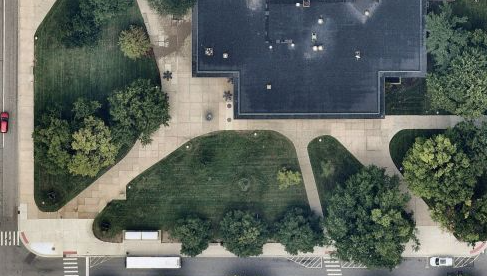 Aerial shot of Pierpont Commons Building and surrounding lawn areas